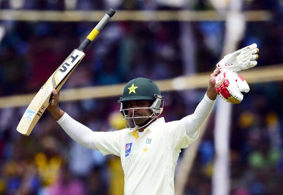 Pakistan cricketer Mohammad Hafeez reacts after scoring a double century (200 runs) on the third day of the first cricket Test match between Bangladesh and Pakistan at the Sheikh Abu Naser Stadium in Khulna on Thursday.