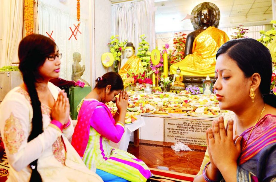 Buddha Purnima being celebrated amid prayers by members of Buddhist Community at cityâ€™s Bashabo temple on Sunday.