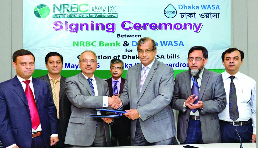 Engr Taqsem A Khan, Managing Director of Dhaka WASA and Dewan Mujibur Rahman, Managing Director of NRB Commercial Bank sign an agreement for online bill payment service at Dhaka WASA board room on Monday. Dhaka WASA customers will be able to pay their wat