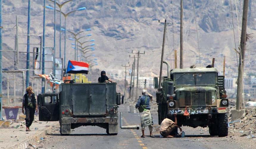 Supporters of Yemen's Southern Separatist Movement keep position around armed vehicles flying the movement's flag near the International airport in the port city of Aden, as battles against Shiite Huthi rebels continue.