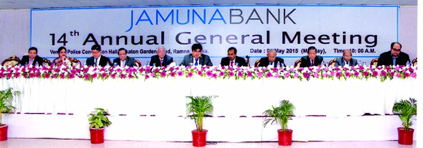 Sirajul Islam Varosha, Chairman of Jamuna Bank Limited, presiding over its 14th Annual General Meeting at a city convention hall on Monday. The AGM approves 19 percent bonus share for its shareholders for the year 2014.
