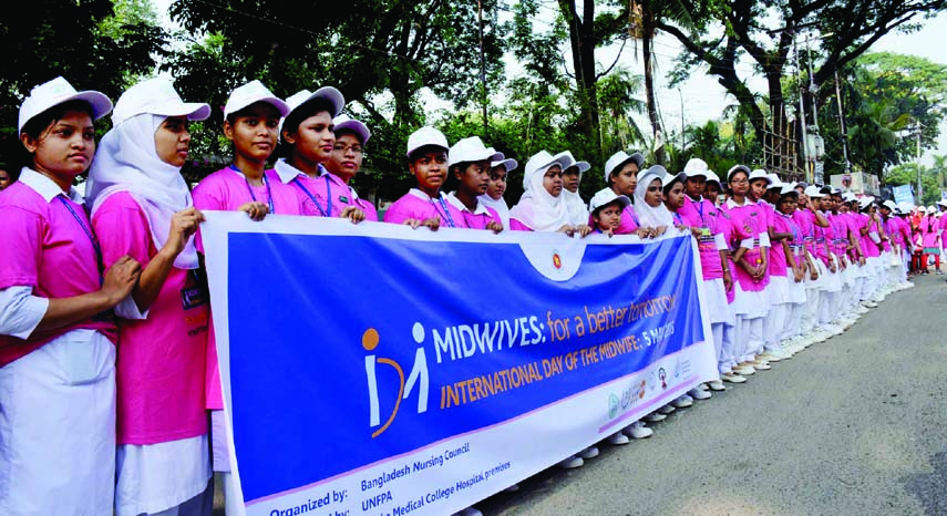 Bangladesh Nursing Council formed a human chain in front of the Jatiya Press Club on Tuesday marking International Midwife Day.