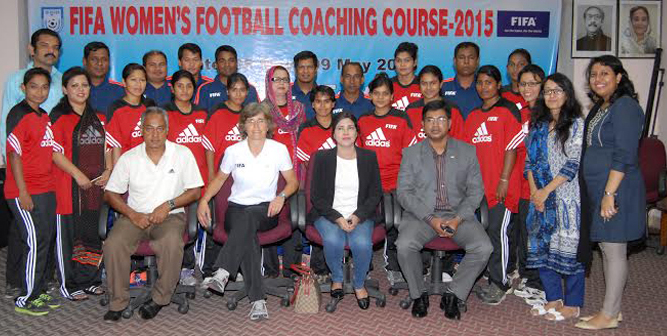 The participants of the opening ceremony of the FIFA Women's Football Coaching Course and the Coaches and officials of Bangladesh Football Federation (BFF) pose for a photo session at the BFF House on Tuesday.