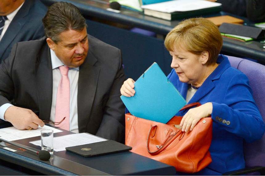German Vice Chancellor, Economy and Energy Minister Sigmar Gabriel and German Chancellor Angela Merkel at the German lower house of Parliament in Berlin.