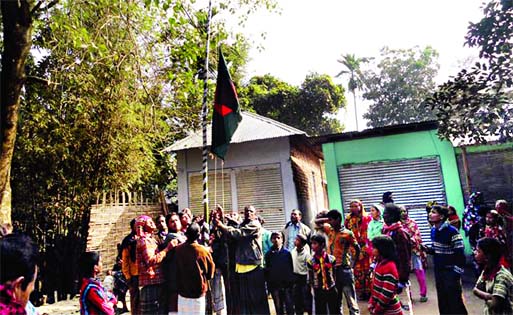 People of no:150 Dashiar Chhara enclave under Fulbari upazila in Kurigram district hoisted national flag of Bangladesh and distributed sweets after the Land Boundary Agreement Bill was passed in Indian Rajya Sabha on Wednesday. Photo Internet