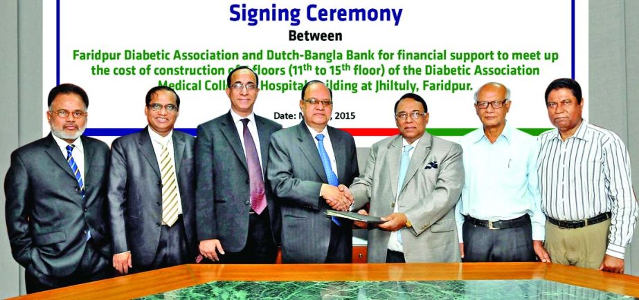 Mir Nasir Hossain, President of Faridpur Diabetic Association & Chairman, Governing Body, Diabetic Association Medical College & Hospital and KS Tabrez, Managing Director of Dutch-Bangla Bank sign MoU at the bank's head office recently. Under the agreeme