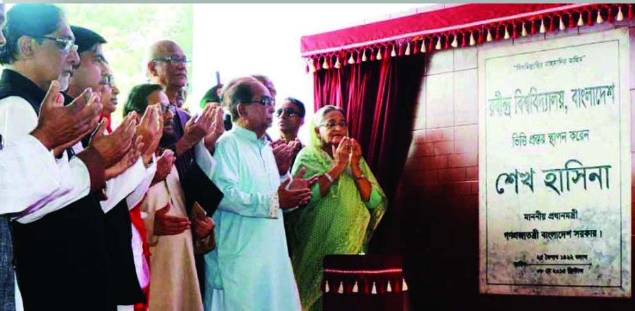 Prime Minister Sheikh Hasina along with others offering munajat after laying foundation stone of Rabindra Bishwabidyalaya, Bangladesh at Shahjadpur in Sirajganj on Friday marking 154th birth anniversary of Kabiguru Rabindranath Tagore.