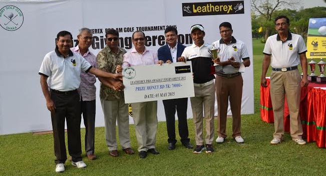 State Minister for Youth and Sports Biren Sikder and Managing Director of Leatherex Footwear Industries Limited Mohammad Nazmul Hasan Sohel handing over the prize to the winner of the Leatherex Pro-Am Golf Tournament at the Army Golf Club in Dhaka Cantonm