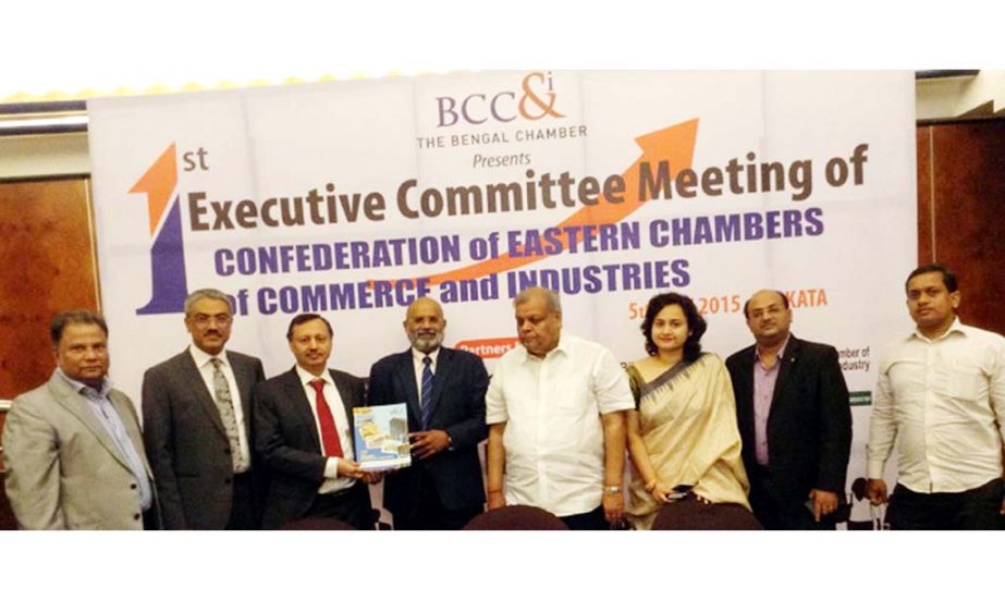 CCCI President Mahabubul Alam presenting souvenir to Dr Alok Roy, Chairman, Confederation of Eastern Chambers of Commerce and Industries at a function at Chamber Auditorium in the city yesterday.