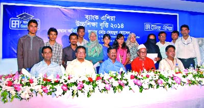 CHANDPUR: Md Mehmood Hussain, President and Managing Director of Bank Asia is seen with the recipients of Bank Asia Higher Studies Scholarship-2014 under Hazigonj Upazila on Saturday. Senior Vice President, Head of HRD of Bank Asia Mamun Mahmud, Assista