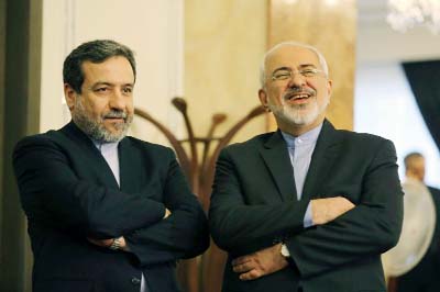Iranian Foreign Minister Javad Zarif (right) and Deputy Foreign Minister and chief nuclear negotiator Abbas Araghchi pictured during a press conference in Tehran .