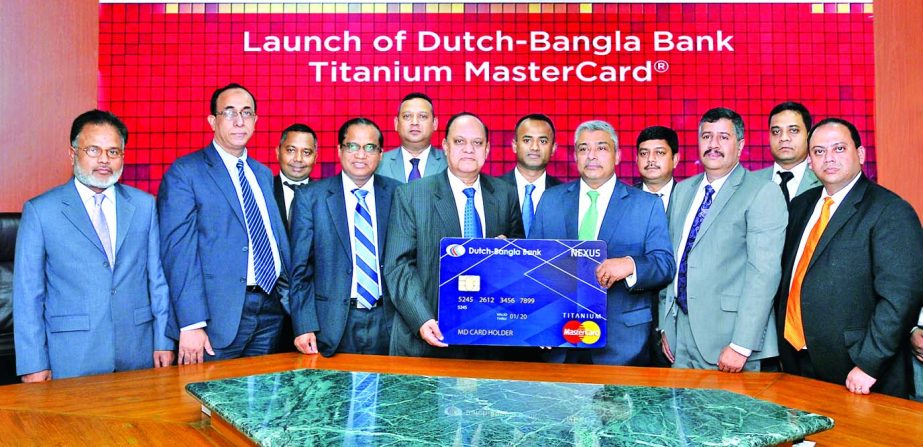 Dutch-Bangla Bank launching 'Titanium Credit Card' at its head office on Tuesday. Vikas Varma, Executive Director and Syed Mohammad Kamal, Country Manager of MasterCard, Bangladesh and KS Tabrez, Managing Director and Abul Kashem Md Shirin, DMD of the b