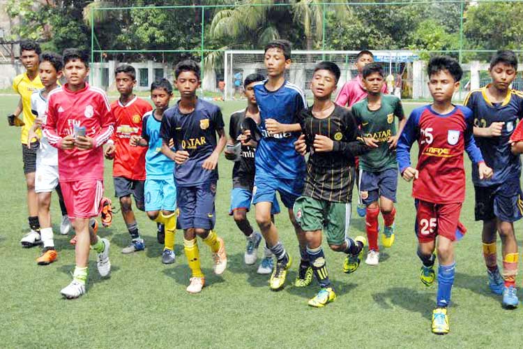Members of Bangladesh Under-12 Football team during their practice session at the BFF Artificial Turf on Wednesday.