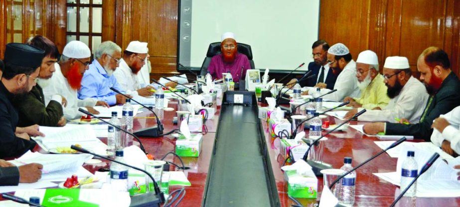 Sayed Ahmad, Vice Chairman of the Shari`ah Supervisory Committee of Islami Bank Bangladesh Limited and Mufti of Al Jamiatus Siddikiah Darul Ulum, presiding over the committee meeting at its tower on Thursday.