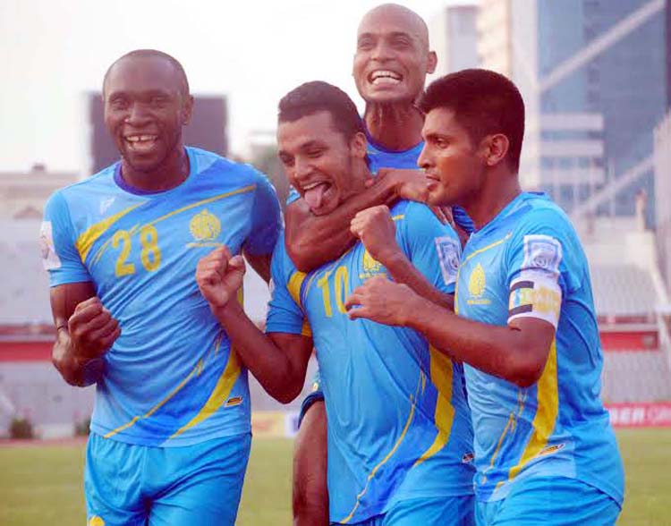 Players of Dhaka Abahani Limited celebrate after beating Sheikh Jamal Dhanmondi Club Limited in their football match of the Manyavar Bangladesh Premier League at the Bangabandhu National Stadium on Thursday.