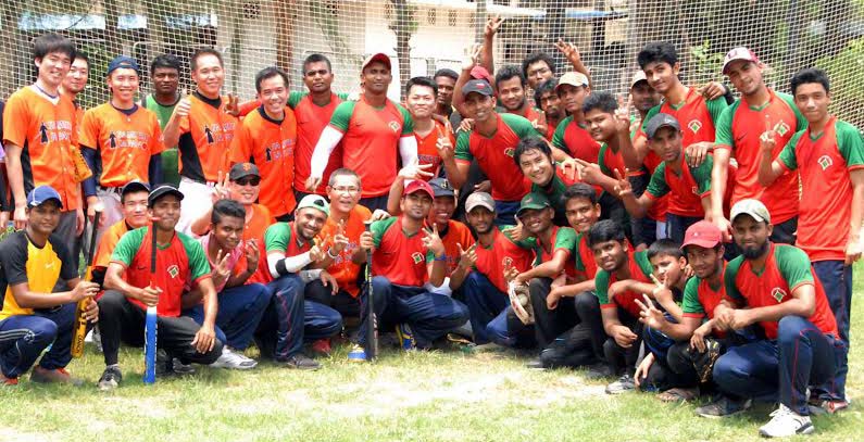 Both Bangladesh and Japani Baseball team pose for photo just before the friendly match at the Paltan ground on Friday.