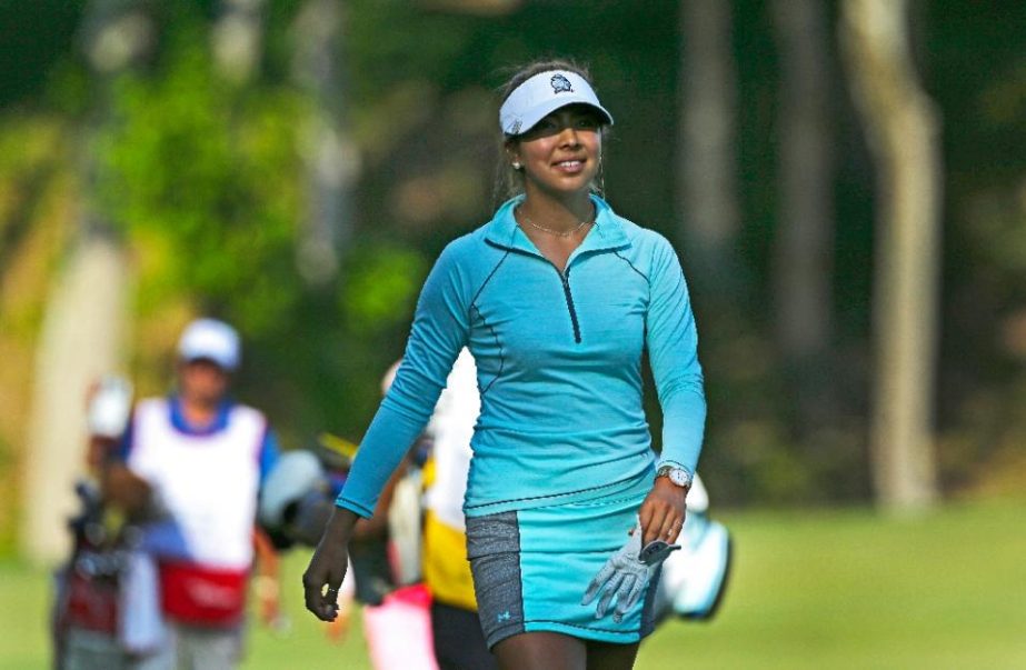 Alison Lee smiles as she walks to her ball on the eighth hole during the second round of the Kingsmill Championship at Kingsmill Resort on Friday in Williamsburg, Virginia.