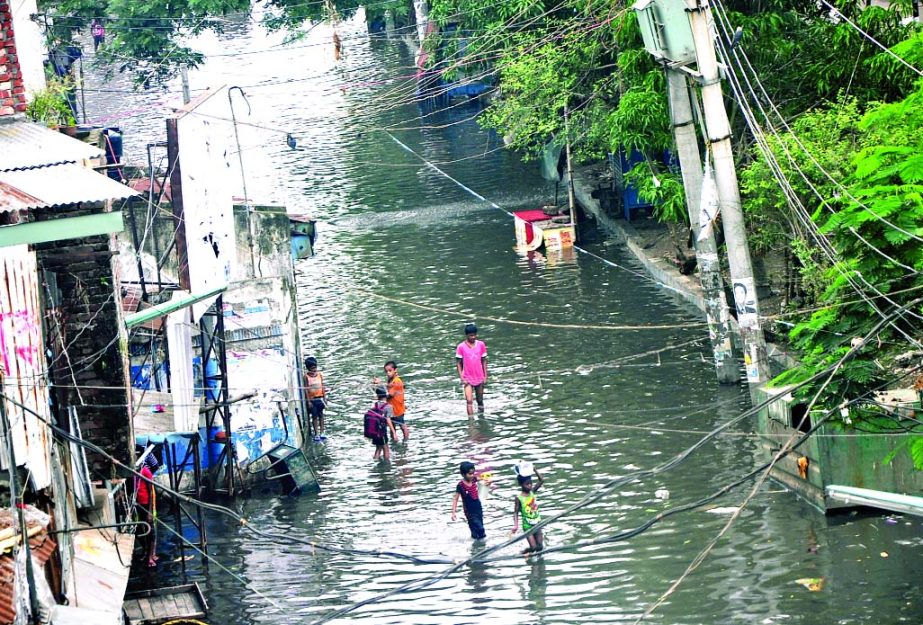 Fridayâ€™s heavy downpour created water-logging in various parts of the city due to poor drainage system, causing sufferings to commuters and pedestrians. This photo was taken from KM Das Lane on Saturday.