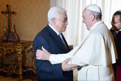 Pope Francis meets Palestinian leader Mahmoud Abbas during an audience at the Vatican on Saturday.