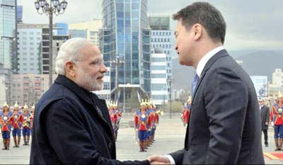 Indian Prime Minister Narendra Modi shaking hands with Mongolian Prime Minister Chimed Saikhanbileg at the State Palace in Ulan Bator on Sunday.