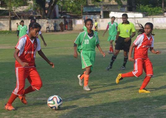 An action from the match of the JFA Under-14 National Women's Football Championship between Meherpur district team and Jhenaidah district team at the Meherpur District Football Stadium on Tuesday. Meherpur won the match 5-0.