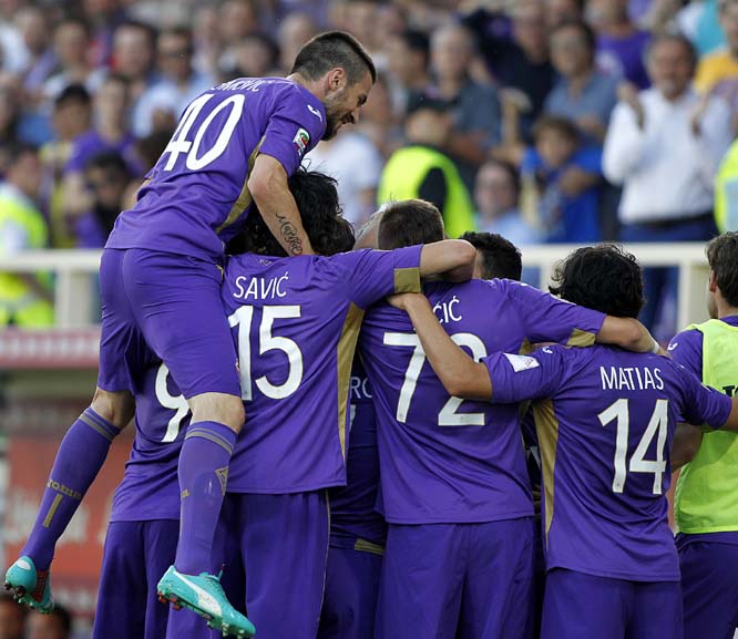 Fiorentina players celebrate after scoring during a Serie A soccer match between Fiorentina and Parma at the Artemio Franchi stadium in Florence, Italy on Monday.