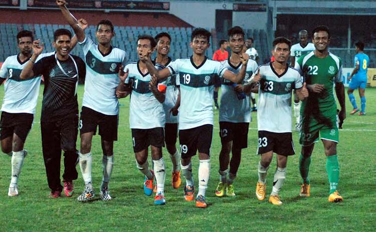 Players of Mohammedan Sporting Club Limited celebrate after beating Dhaka Abahani Limited in their football match of the Manyavar Bangladesh Premier League at the Bangabandhu National Stadium on Wednesday.