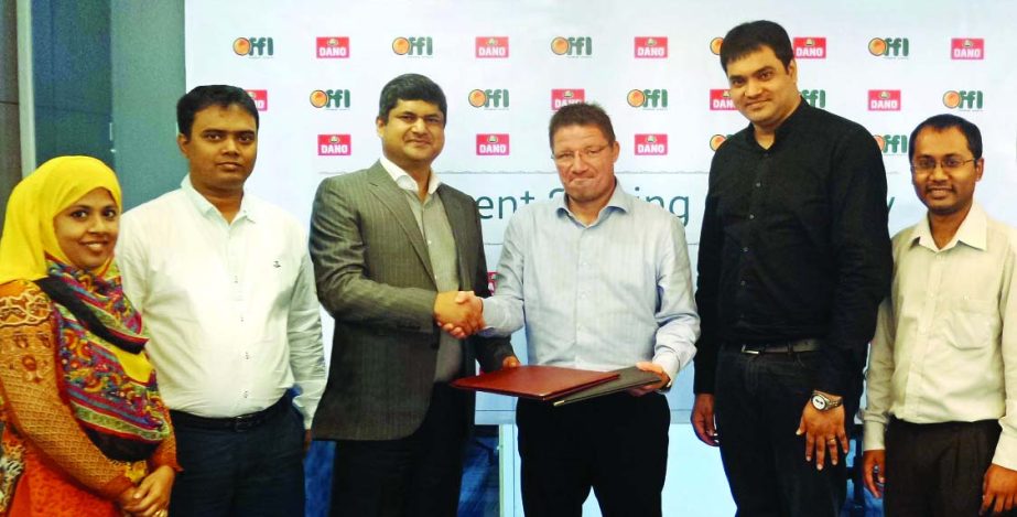 Peter Hallberg, Deputy General Manager of Arla Foods Bangladesh Limited, sign a distributorship agreement with Md Ruhul Alam Al Mahbub, Managing Director of Fair Food & Lifestyle recently.