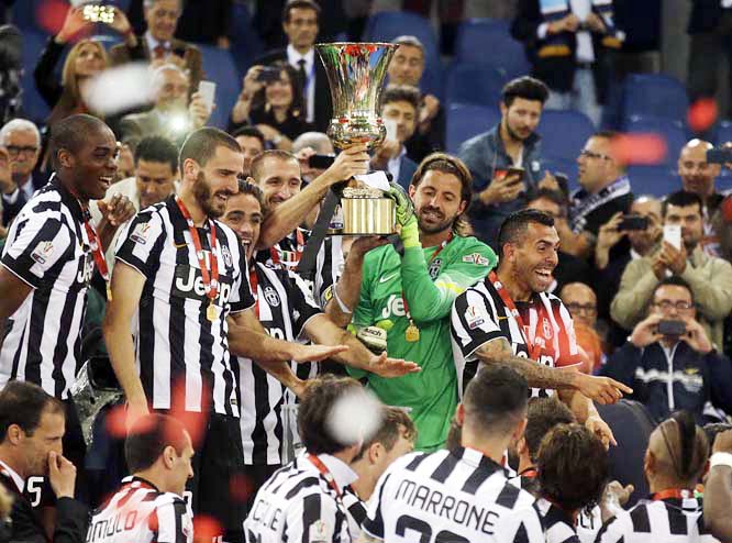 Juventus' players celebrate at the end of the Italian Cup soccer final match between Lazio and Juventus at Rome's Olympic stadium on Wednesday. Juventus won 2 - 1.