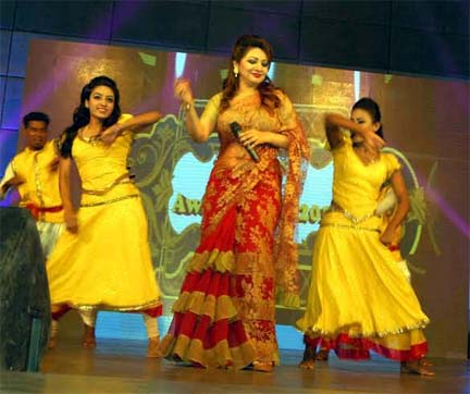 The artistes perform a glamourous cultural show marking the BFF Award Night 2015 at the Auditorium of National Sports Council Tower on Saturday. Banglar Chokh