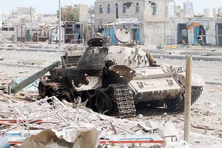 A destroyed tank sits in the Dar Saad neighbourhood of Aden.