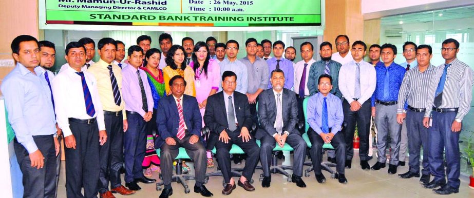 Md Nazmus Salehin, Managing Director and CEO of Standard Bank, poses with the participants of a daylong workshop on 'Money Laundering Prevention and Combating Financing Terrorism' organized by the Training Institute of the bank. Mamun-Ur-Rashid, Deputy