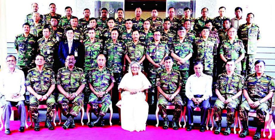 Prime Minister Sheikh Hasina along with Generals poses for photograph in the Conference Room of Dhaka Cantonment on Thursday after a meeting. BSS PhotonBSS photo