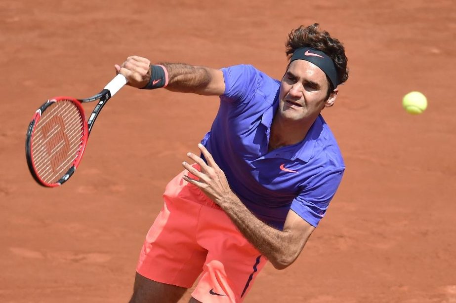 Switzerland's Roger Federer serves to Spain's Marcel Granollers during the men's second round at the French Open on Wednesday.