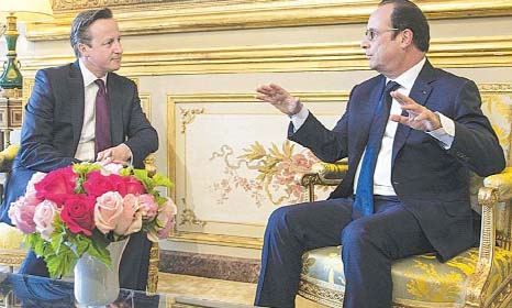 French President Francois Hollande meets British Prime Minister David Cameron at the Elysee Palace on Thursday.