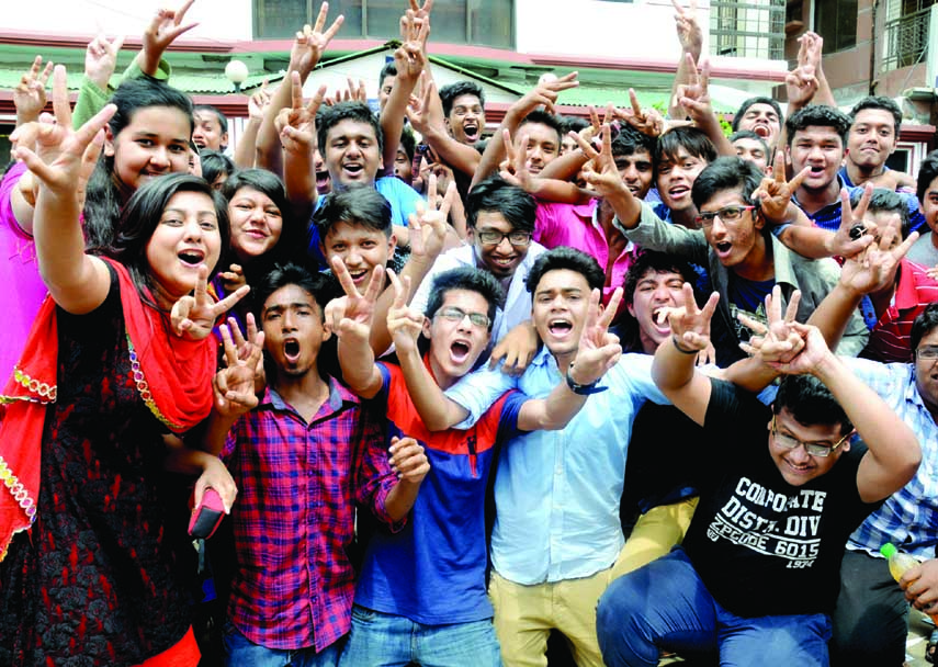 Students of the city's Milestone School and College showing victory (V) sign after receiving their brilliant result of the SSC examination.