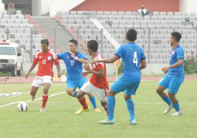 An action of a FIFA International Friendly Football match between Bangladesh National Football team and Singapore National Football team at the Bangabandhu National Stadium on Saturday.