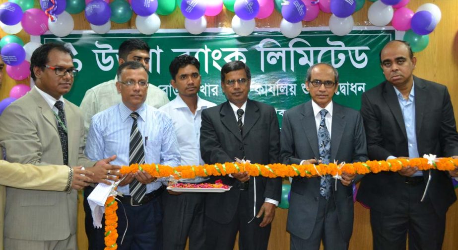 Sheikh Abdul Aziz, Managing Director of Uttara Bank Ltd, inaugurating new premises of the bank at Saima Vhander Market, Double Mooring, Chittagong on Sunday.