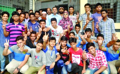 BORGA: Examinees of Bogra Zilla School showing V-sign as they have placed second position in top 20- list in the SSC Examination under Rajshahi Education Board on Saturday.