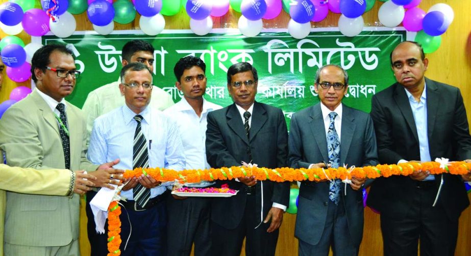 Sheikh Abdul Aziz, Managing Director of Uttara Bank Ltd, inaugurating new premises of the bank at Saima Vhander Market, Double Mooring, Chittagong on Sunday.