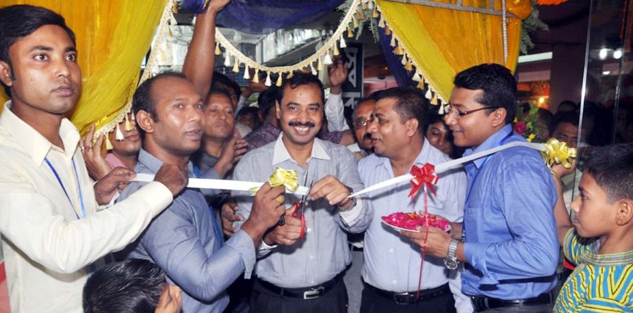 CCC Mayor AJM Nasir Uddin inaugurating Lords' Tailor and Fabric at Chittagong Shopping canter in Sholo Shahor on Sunday.