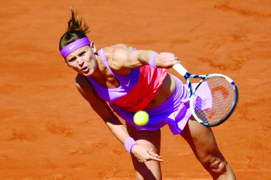 Czech Republic's Lucie Safarova serves to Serbia's Ana Ivanovic during their French Open women's semi-final match in Paris, France on Thursday.