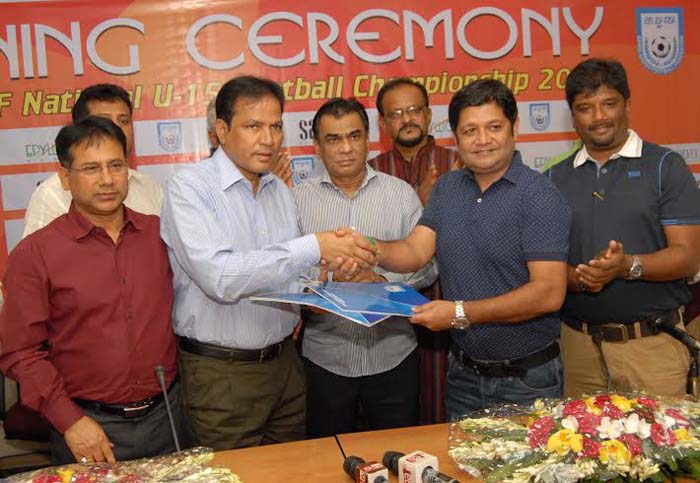 Vice-President of Bangladesh Football Federation (BFF) Badal Roy and Managing Director of Epillion Group Riazuddin Al Mamun shaking hands after signing in the MOU between BFF and Epillion Group at the BFF House on Sunday.
