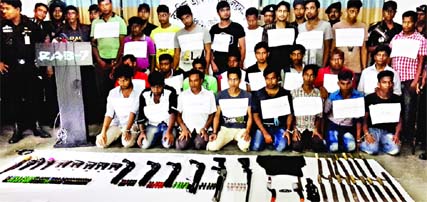 A RAB team in a secret drive arrested 26 associates of AL leader Nizam Hazari of Feni along with huge illegal arms from 3 microbuses on Dhaka-Chittagong Highway at Lalpool area on Saturday night.