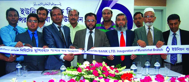 Sayed Abdullah Mohammad Saleh, Deputy Managing Director of Union Bank Ltd, inaugurating a new branch at Munshirhat in Rajshahi on Monday.