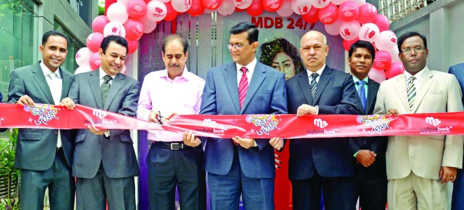 Rezaul Karim, Chairman of the Executive Committee of the Board of Directors of Midland Bank Limited, inaugurating the ATM Booth of the bank near to its Gulshan Branch on Sunday. Md Ahsan-uzZaman, Managing Director & CEO of the bank was present.
