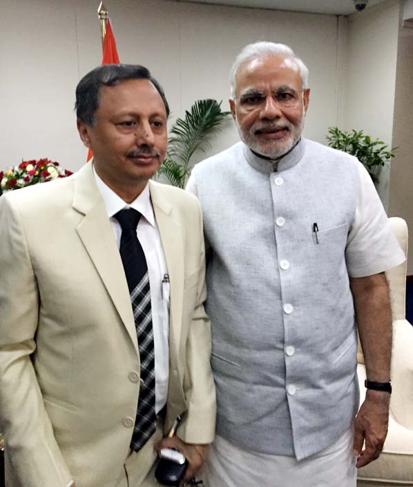 CCCI President Mahabubul Alam seen with Indian Prime Minister Narendra Modi at a function in Dhaka on Sunday.