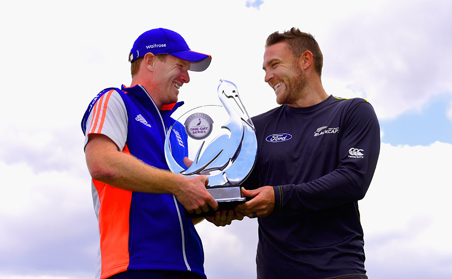 Eoin Morgan and Brendon McCullum pose with the Royal London one-day trophy at Edgbaston on Monday.