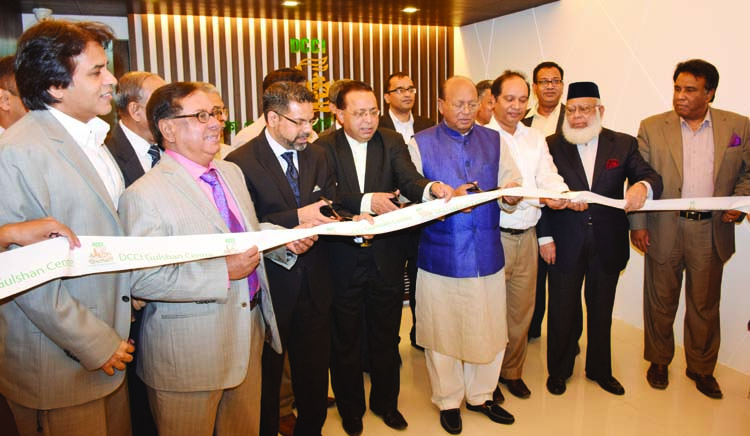 Commerce Minister Tofail Ahmed, inaugurating DCCI Gulshan Centre in the city on Monday. DCCI President Hossain Khaled and FBCCI President Abdul Matlub Ahmad were present.