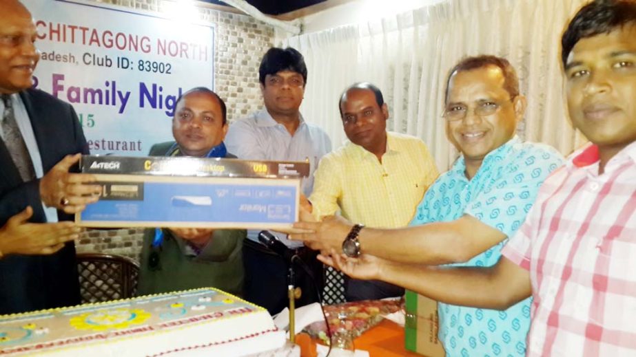 Rotary Club of Chittagong handing over computer to the members of Rawjan Club at a function yesterday.